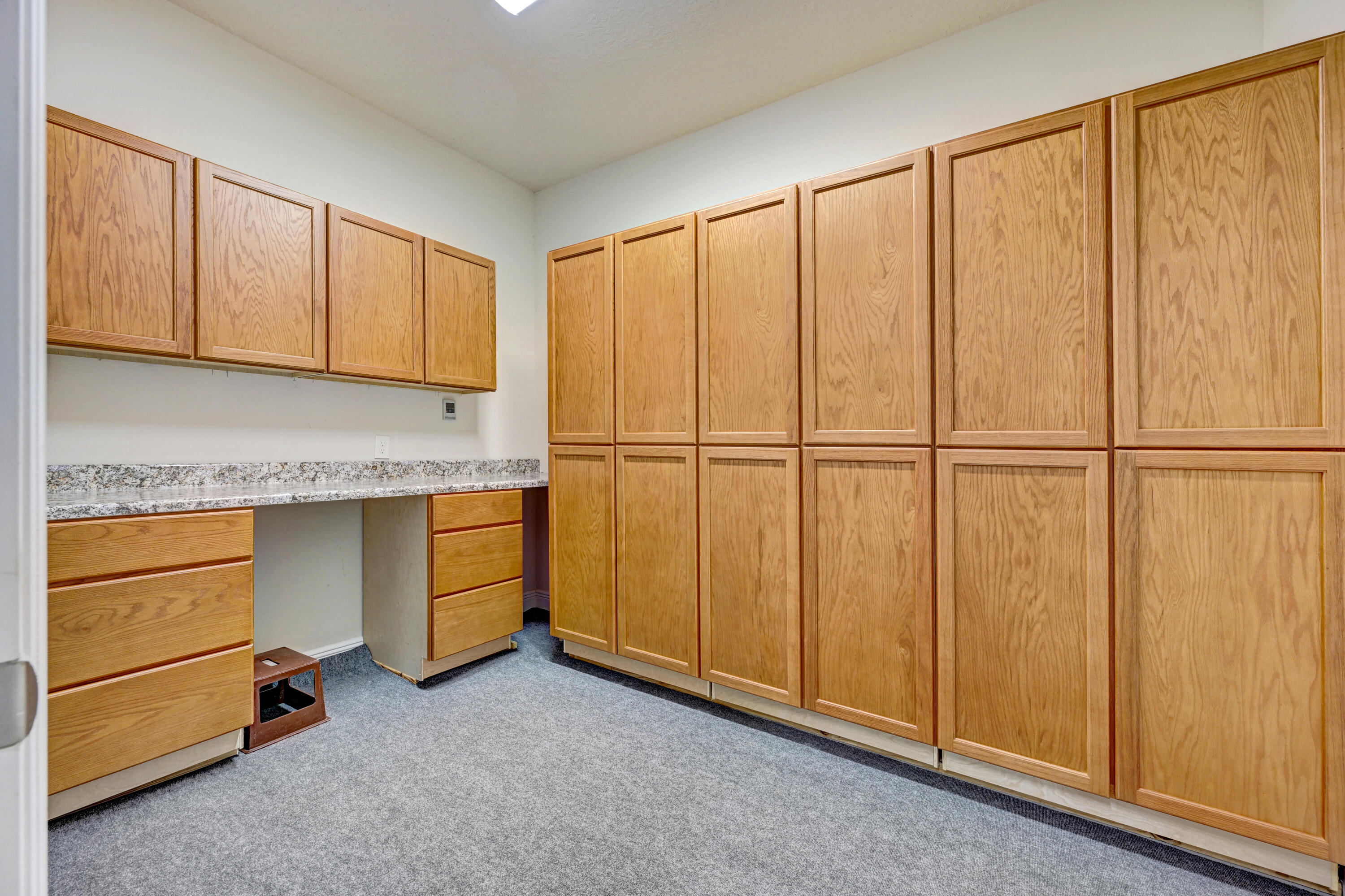 2690 Weber Road Malabar, FL 32950 - Photo 45 of 60 a view of a utility room with cabinets