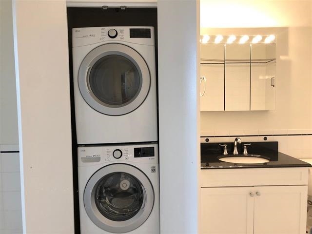 1500 Washington Street, Unit 8I Hoboken, NJ 07030 - Photo 12 of 21 a utility room with dryer and washer