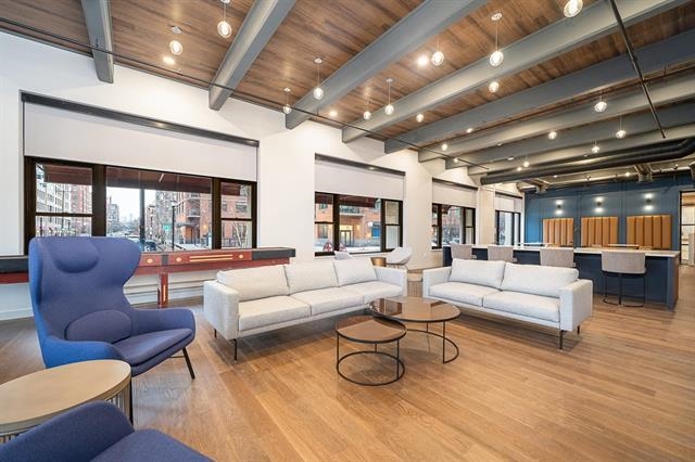 1500 Washington Street, Unit 8I Hoboken, NJ 07030 - Photo 17 of 21 a living room with furniture and a large window