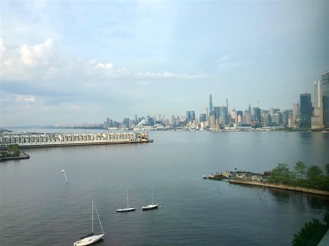 1500 Washington Street, Unit 8I Hoboken, NJ 07030 - Photo 3 of 21 a view of a city and a mountain view