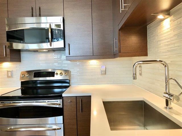 1500 Washington Street, Unit 8I Hoboken, NJ 07030 - Photo 5 of 21 a kitchen with a sink and microwave