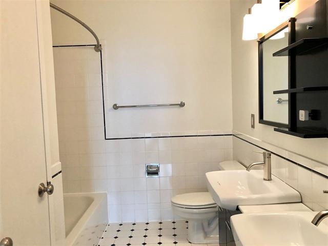 1500 Washington Street, Unit 8I Hoboken, NJ 07030 - Photo 8 of 21 a bathroom with a toilet and a shower
