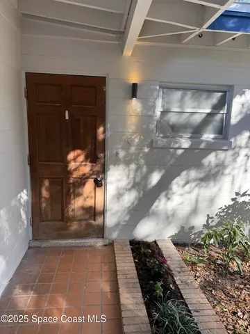 a view of a entryway door of the house