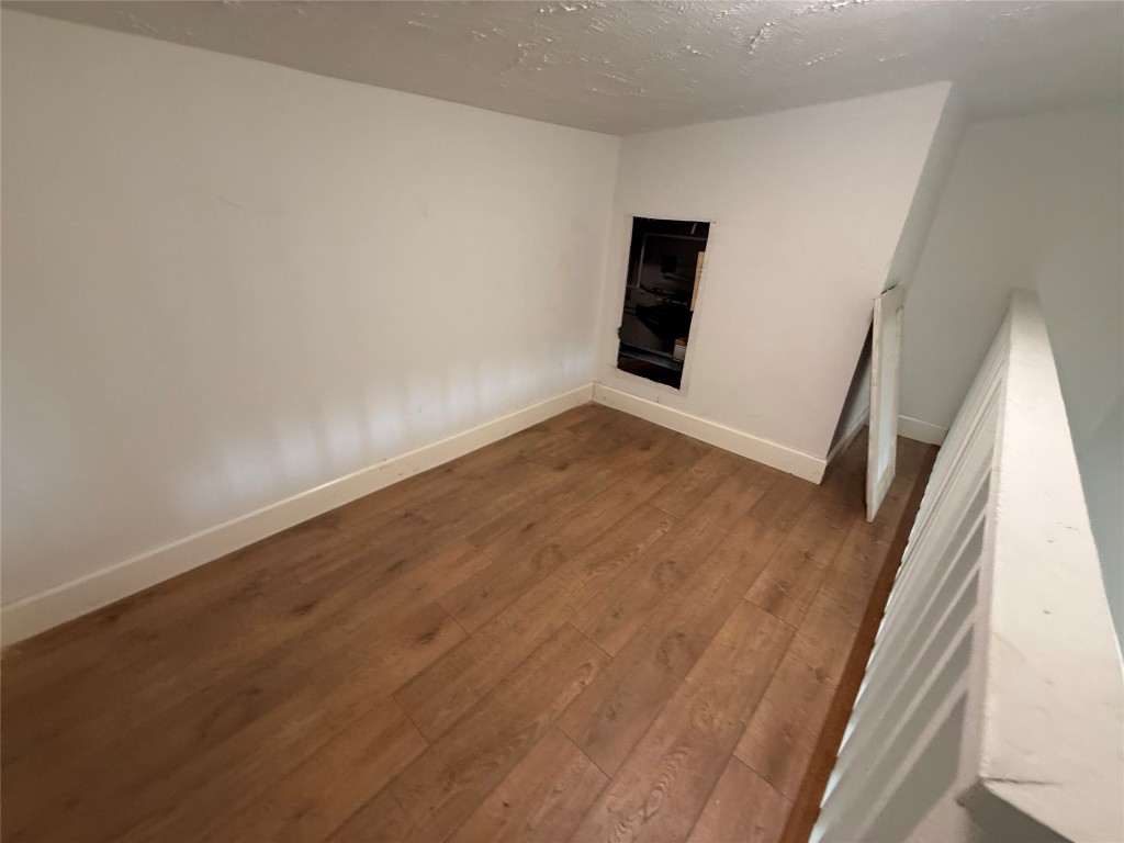 5914 Cullen Boulevard Houston, TX 77021 - Photo 11 of 16 a view of a hallway in a house