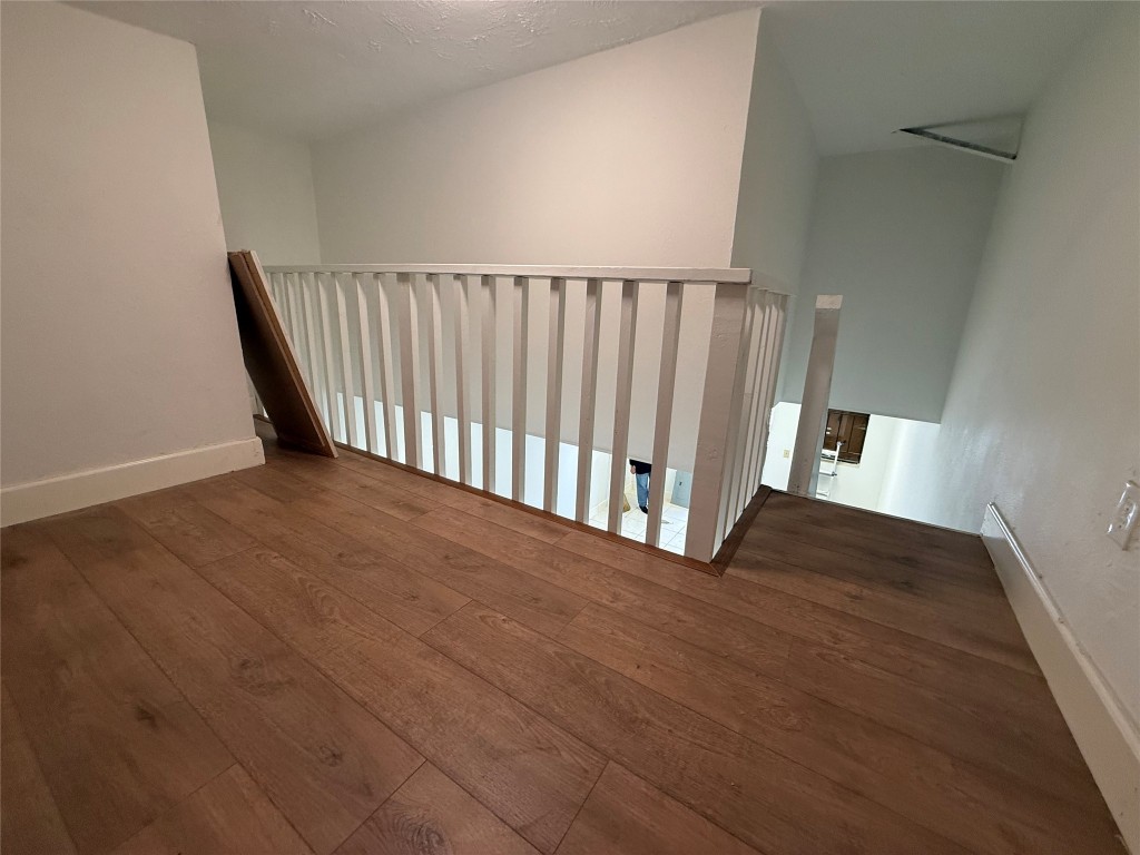 5914 Cullen Boulevard Houston, TX 77021 - Photo 13 of 16 a view of a hallway with wooden floor