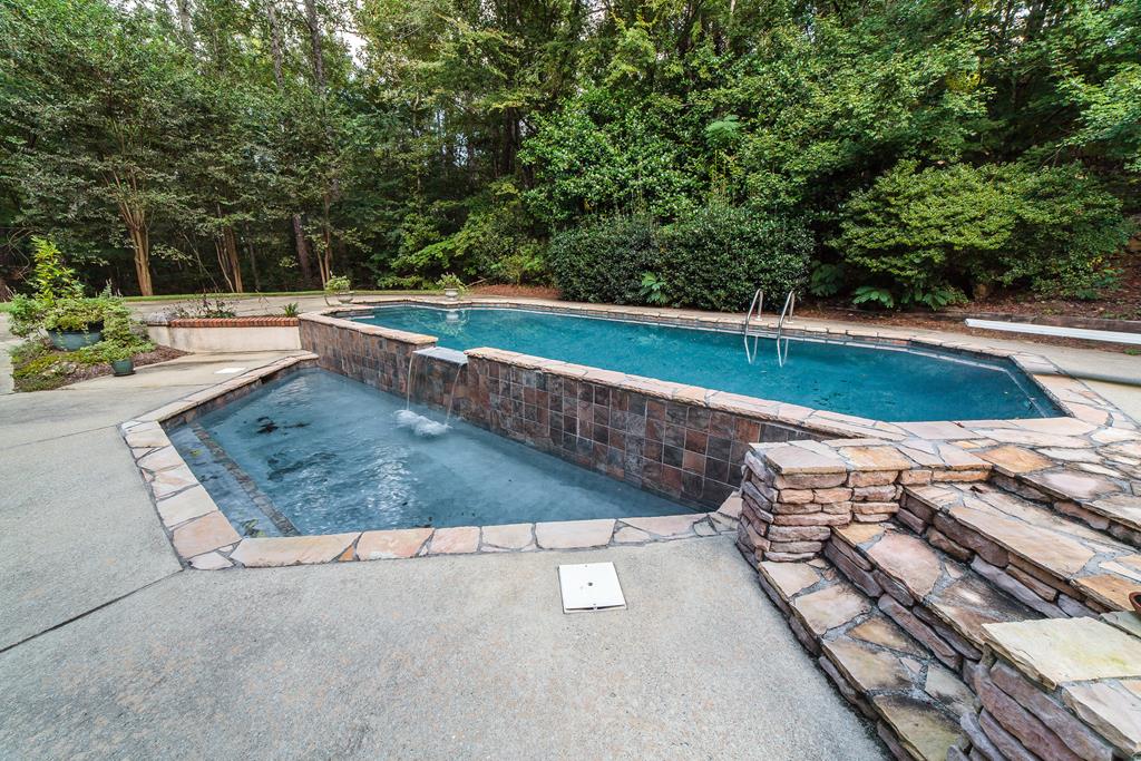 707 Double Churches Road Columbus, GA 31904 - Photo 12 of 59 Stonework accent surround on pool.