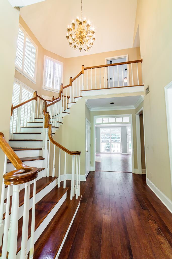 707 Double Churches Road Columbus, GA 31904 - Photo 13 of 59 Curved staircase welcomes you to this warm home.
