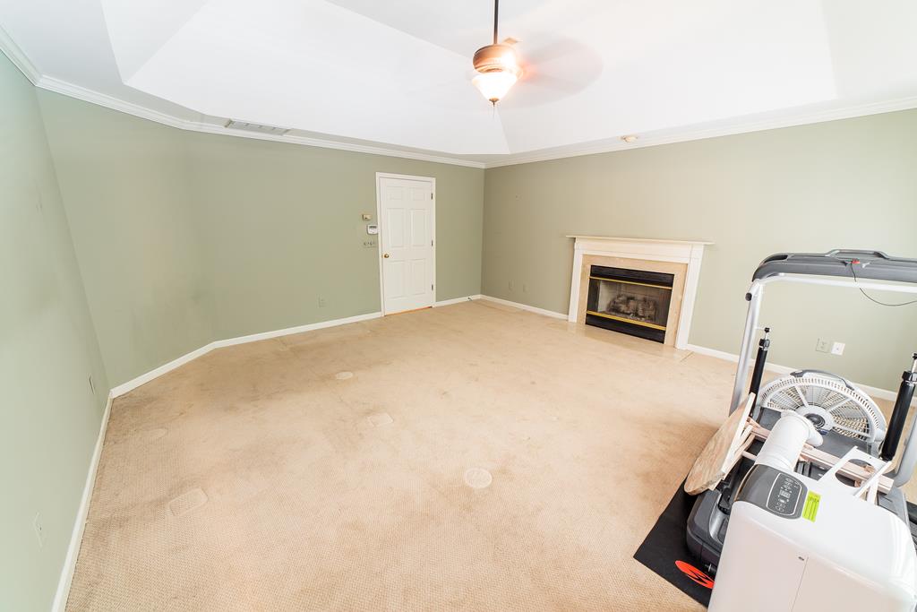 707 Double Churches Road Columbus, GA 31904 - Photo 33 of 59 Master suite also offers fireplace with gas logs.
