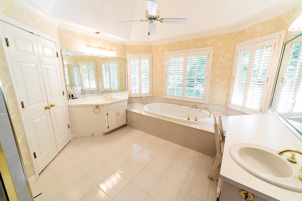 707 Double Churches Road Columbus, GA 31904 - Photo 35 of 59 Bright master bath with separate sinks and tub.