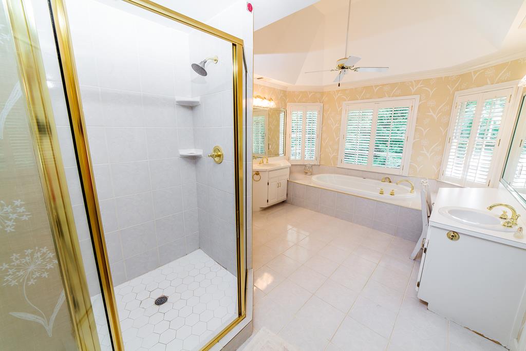 707 Double Churches Road Columbus, GA 31904 - Photo 37 of 59 Separate glassed in shower in master bath.