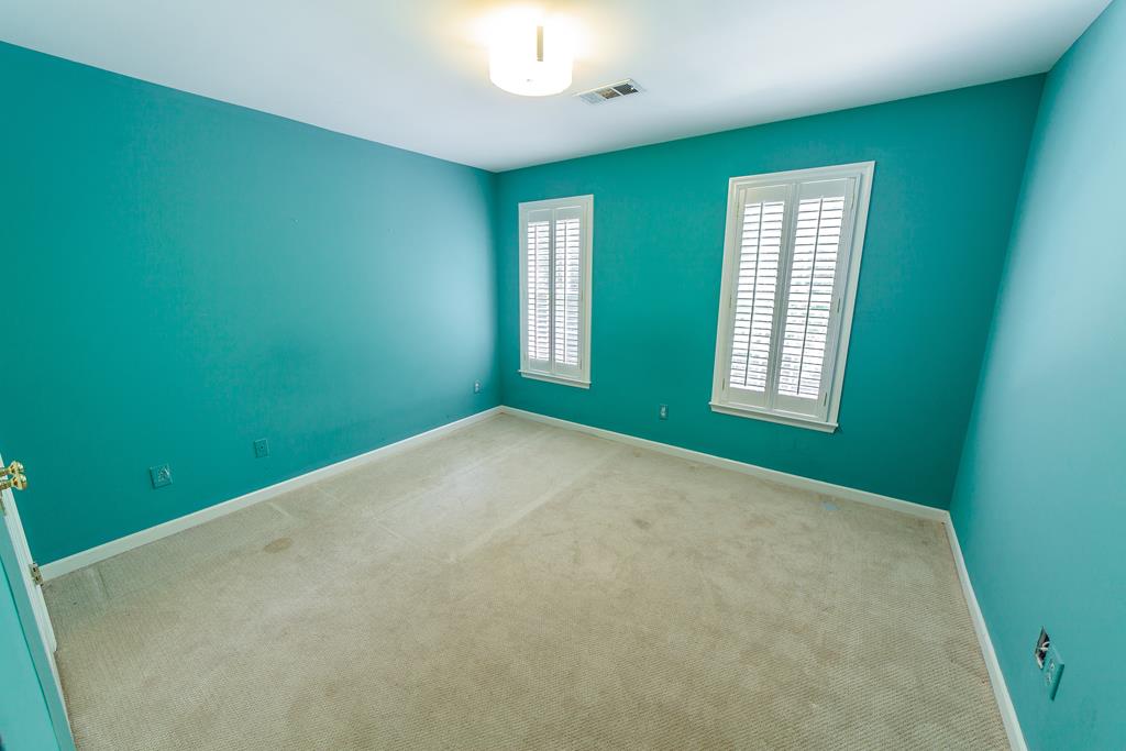 707 Double Churches Road Columbus, GA 31904 - Photo 46 of 59 Bright Bedroom with plantation shutters.