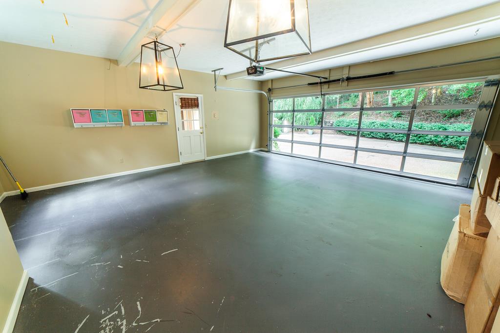 707 Double Churches Road Columbus, GA 31904 - Photo 56 of 59 Updated lighting in garage. Glass garage door for