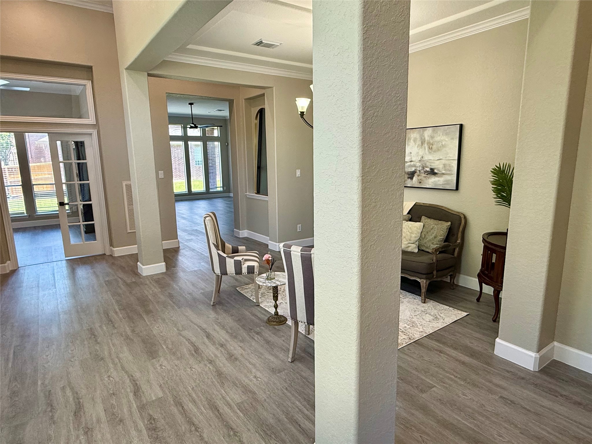 7218 Spring Meadow Lane Katy, TX 77494 - Photo 4 of 30 a living room with furniture and a wooden floor