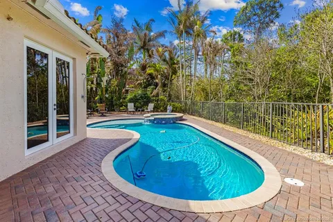 $925,000 | 904 Southwest Pebble Lane, Palm City, FL 34990