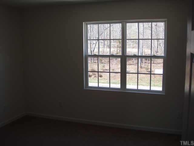 844 Horton Road, Unit 77 Durham, NC 27704 - Photo 11 of 11 Nice sized master bedroom with large windows allowing in natural light. Other