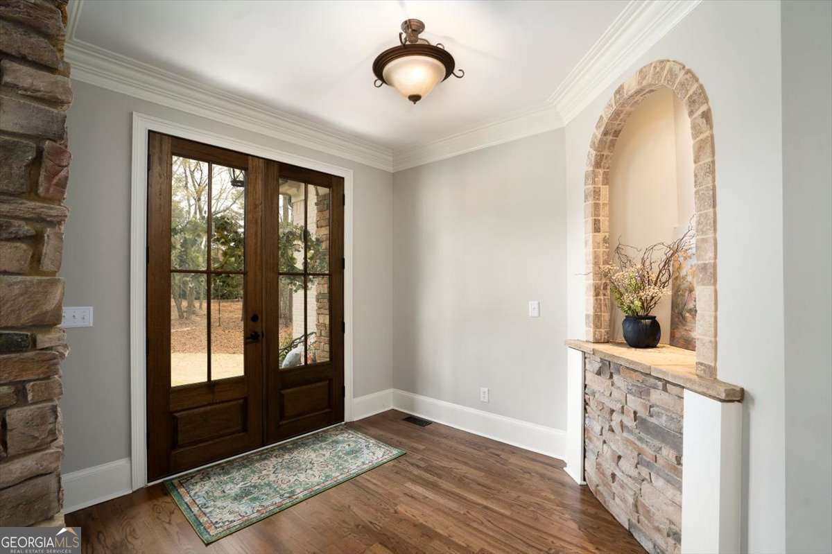 1070 Lexington Court Bishop, GA 30621 - Photo 3 of 67 a view of a room with wooden floor and windows