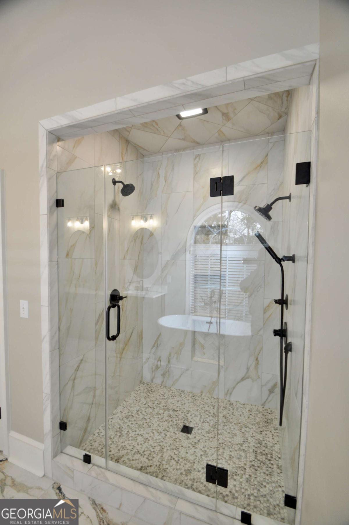 1070 Lexington Court Bishop, GA 30621 - Photo 31 of 67 a bathroom with a shower