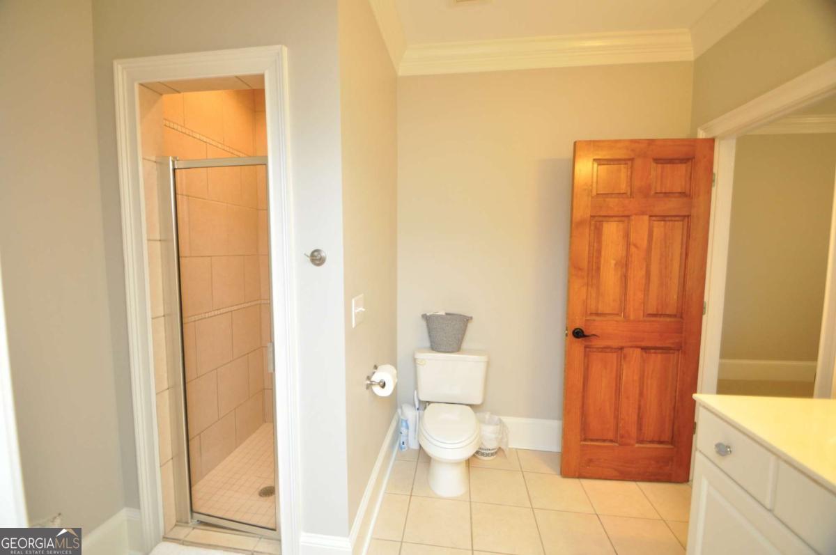 1070 Lexington Court Bishop, GA 30621 - Photo 38 of 67 a bathroom with a toilet