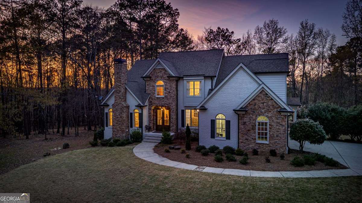 1070 Lexington Court Bishop, GA 30621 - Photo 65 of 67 a front view of a house with a yard