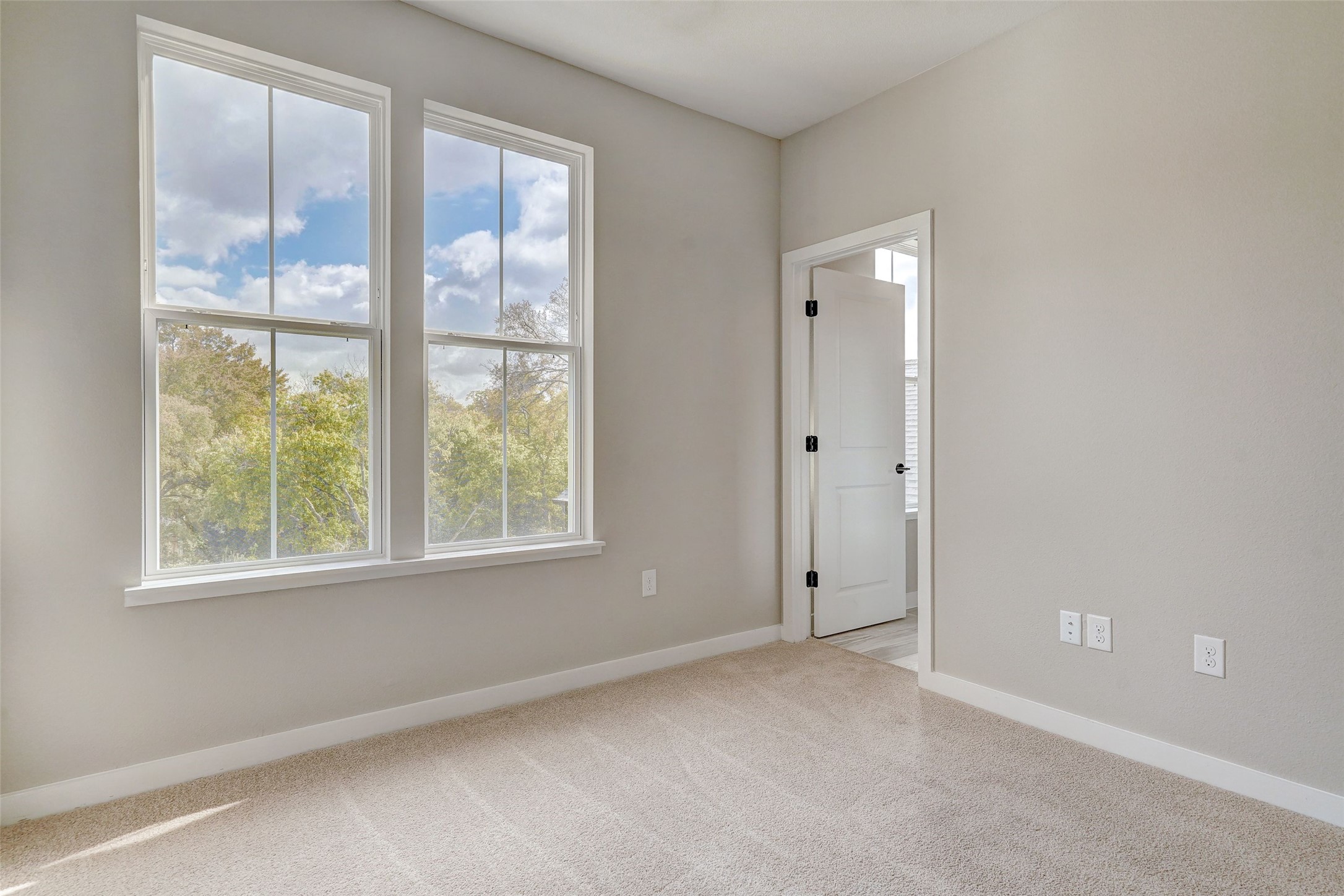 3809 Valley View Road, Unit 13 Austin, TX 78704 - Photo 12 of 27 an empty room with windows