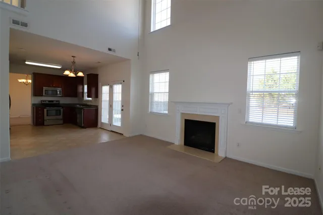 a view of a livingroom with a fireplace