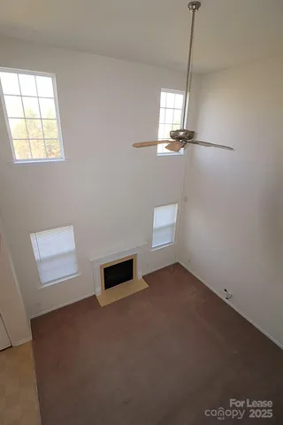 a view of empty room with windows