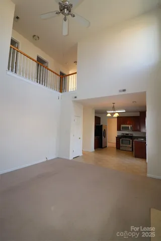 a view of a livingroom with a staircase