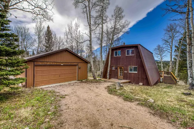 a house with yard in front of it