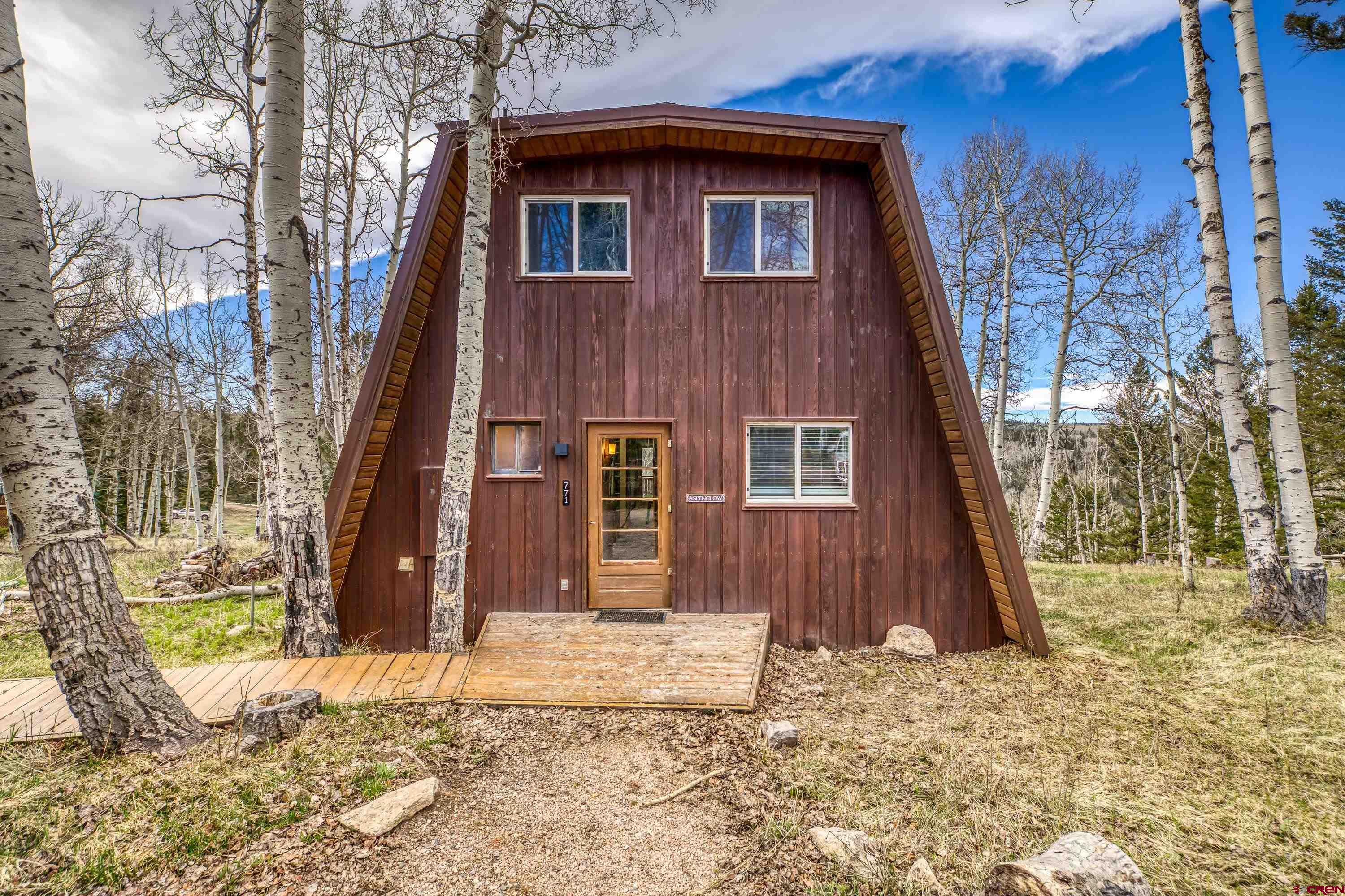 771 Spruce Road Cimarron, CO 81220 - Photo 6 of 34 a front view of a house