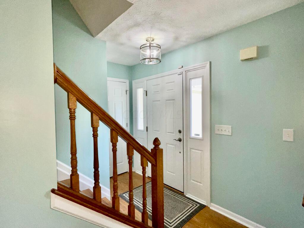 5294 Bressler Drive Hilliard, OH 43026 - Photo 17 of 45 Beautiful front door with sidelights. Let's look upstairs!