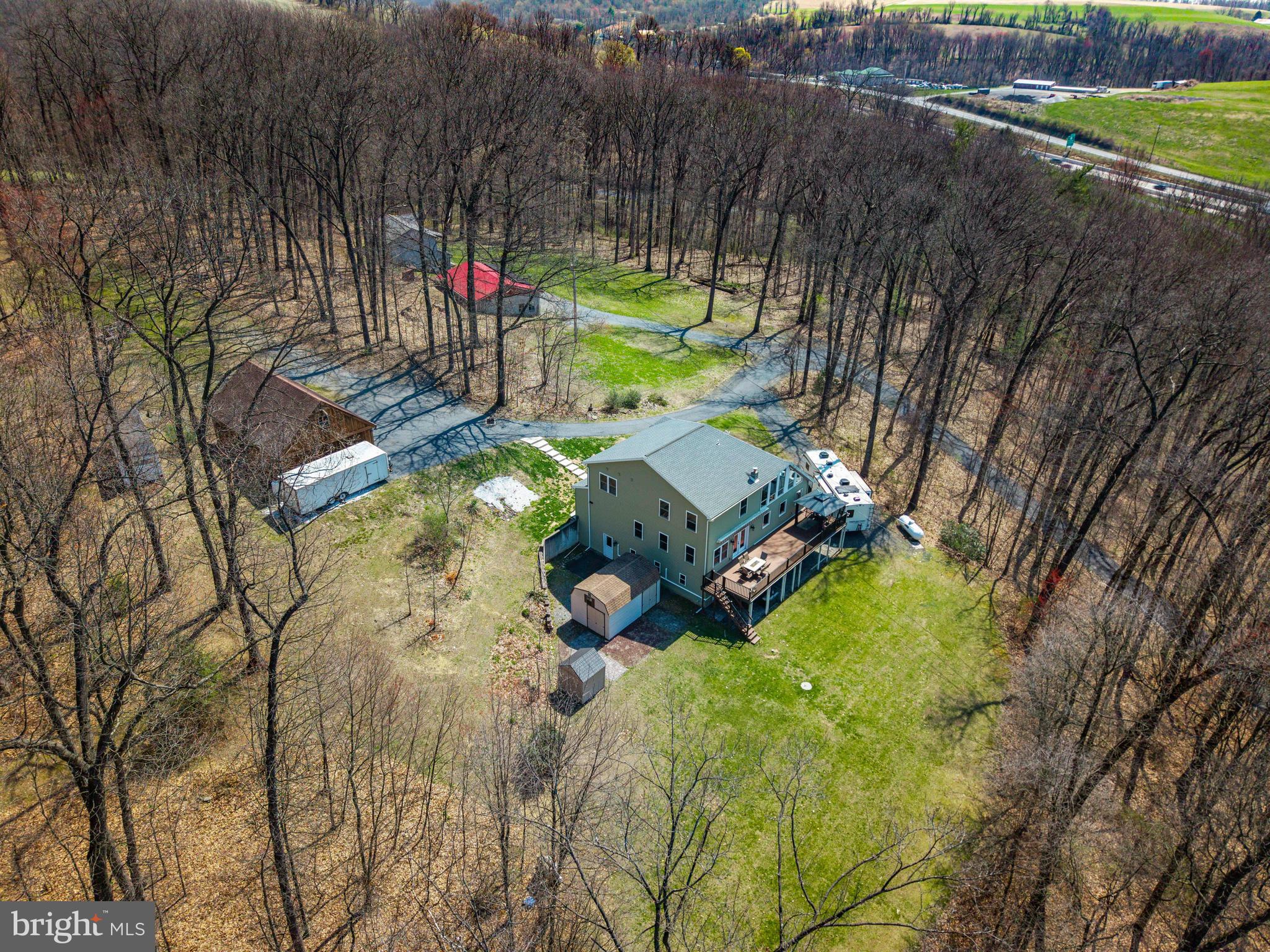 51 Hausman Road Lenhartsville, PA 19534 - Photo 16 of 64 an aerial view of a house with a yard basket ball court and outdoor seating