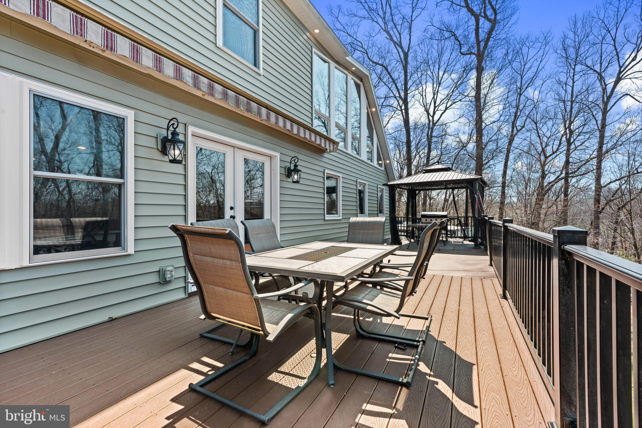 51 Hausman Road Lenhartsville, PA 19534 - Photo 23 of 64 a view of a patio with table and chairs and wooden floor