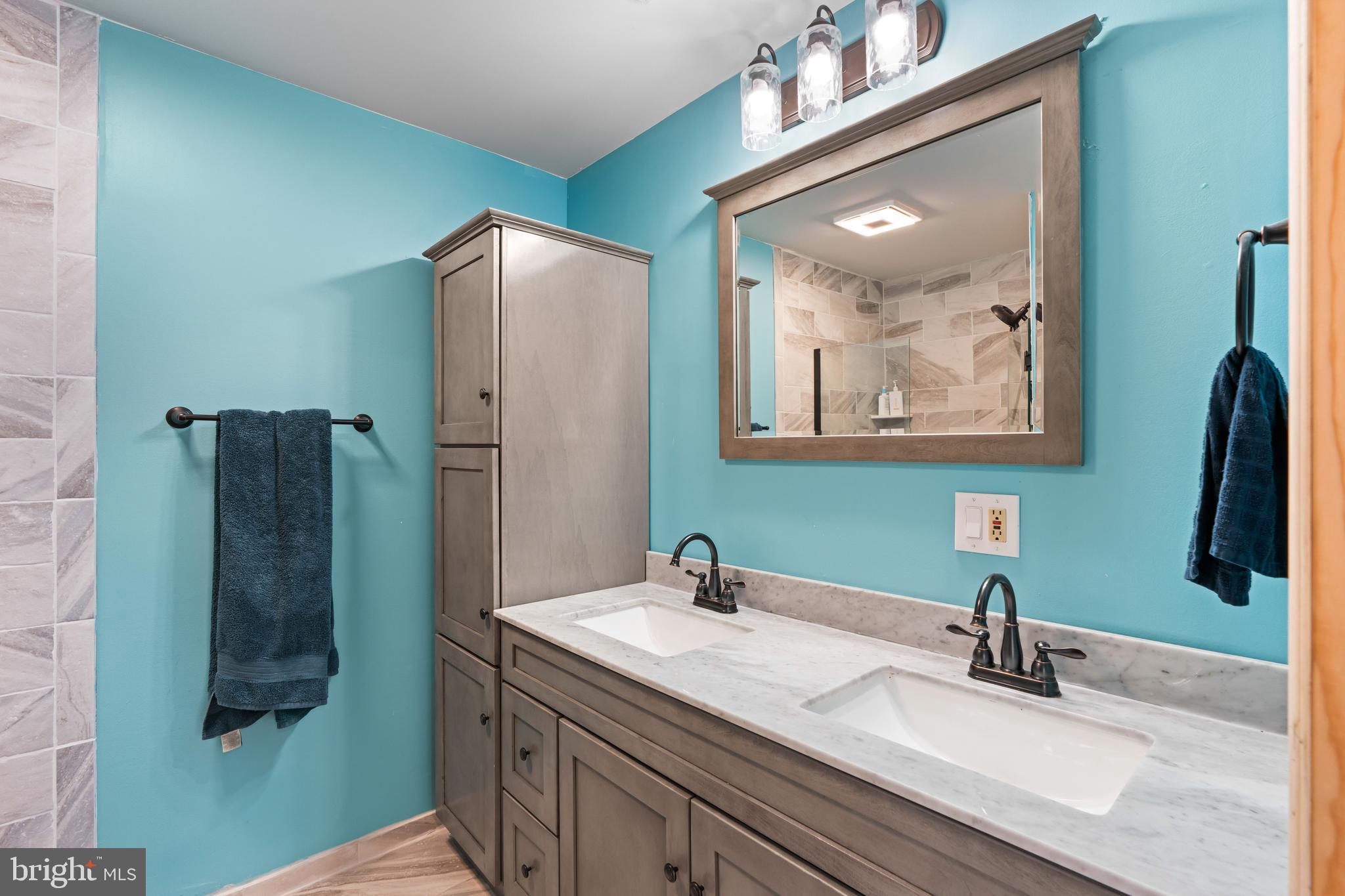 51 Hausman Road Lenhartsville, PA 19534 - Photo 38 of 64 a bathroom with a sink and a mirror