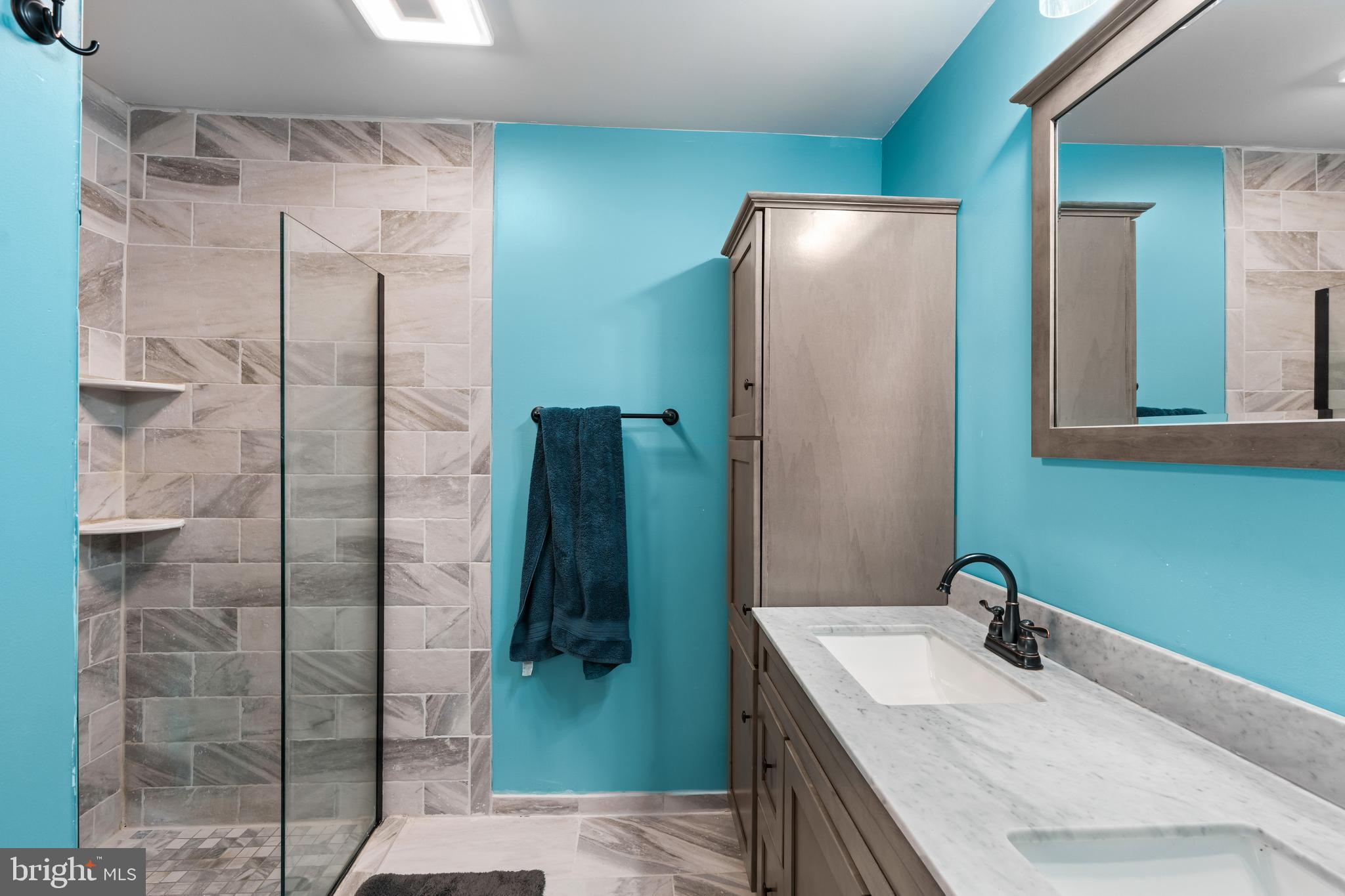 51 Hausman Road Lenhartsville, PA 19534 - Photo 40 of 64 a bathroom with a sink and mirror
