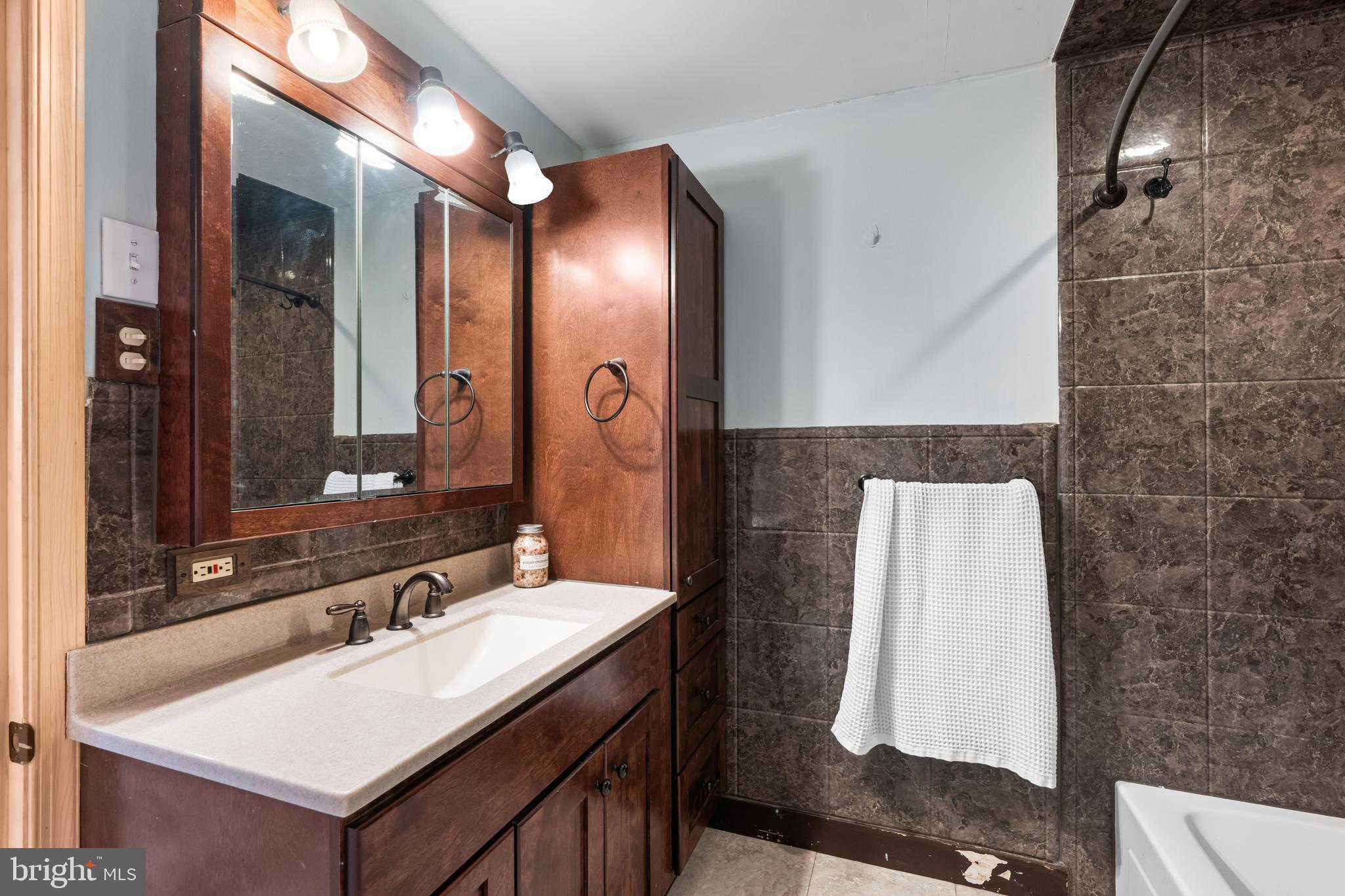 51 Hausman Road Lenhartsville, PA 19534 - Photo 49 of 64 a bathroom with a sink and a mirror
