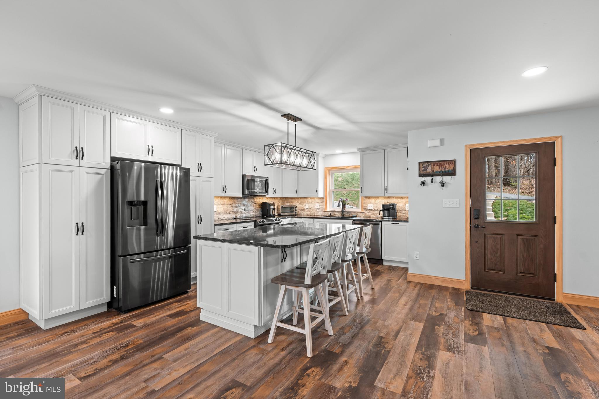 51 Hausman Road Lenhartsville, PA 19534 - Photo 5 of 64 a kitchen with stainless steel appliances granite countertop a refrigerator and a stove top oven