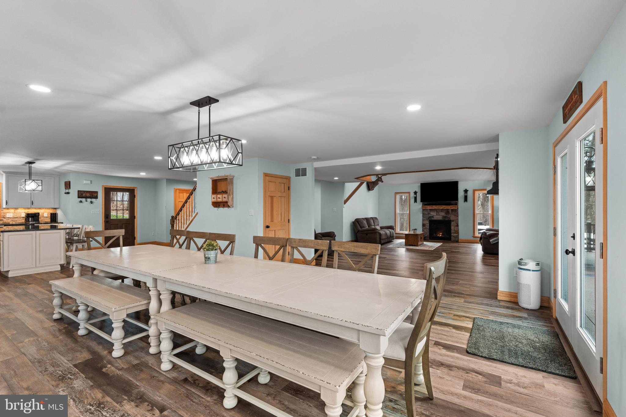 51 Hausman Road Lenhartsville, PA 19534 - Photo 54 of 64 a view of a dining room with furniture a chandelier and wooden floor