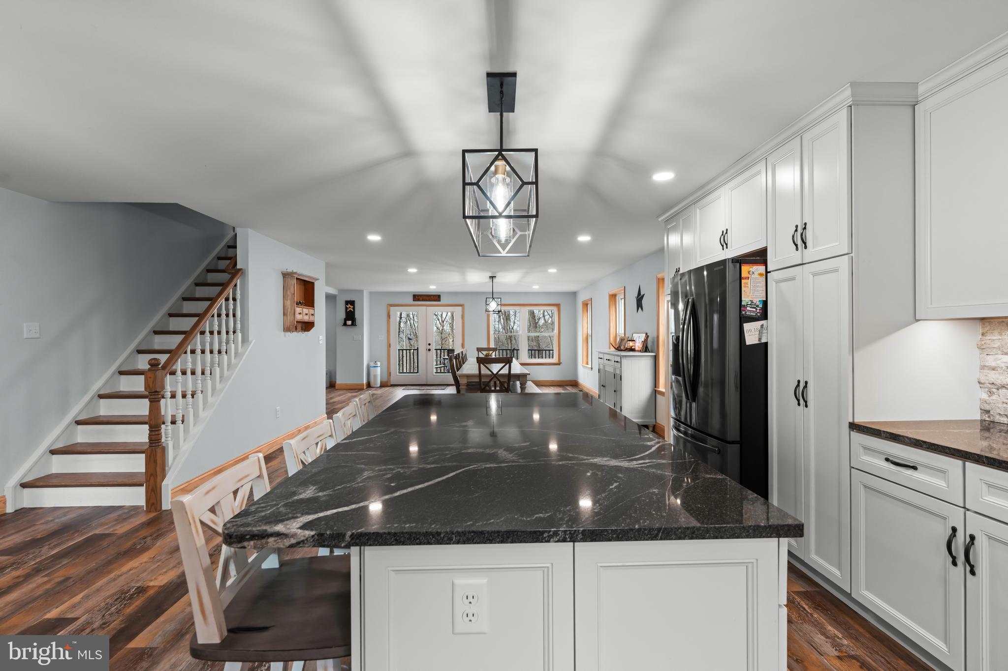 51 Hausman Road Lenhartsville, PA 19534 - Photo 62 of 64 a large kitchen with stainless steel appliances granite countertop a sink a stove and a refrigerator