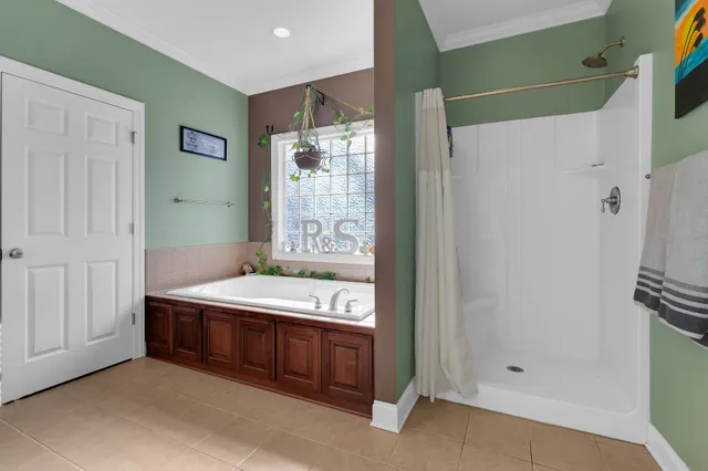 a bathroom with a toilet and a bathtub