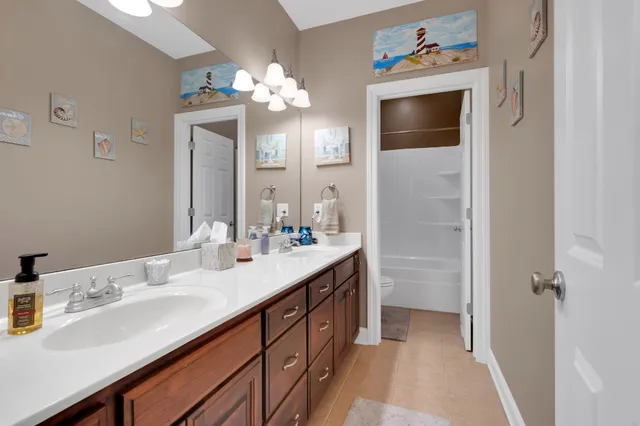 a outdoor view with a sitting space and large windows