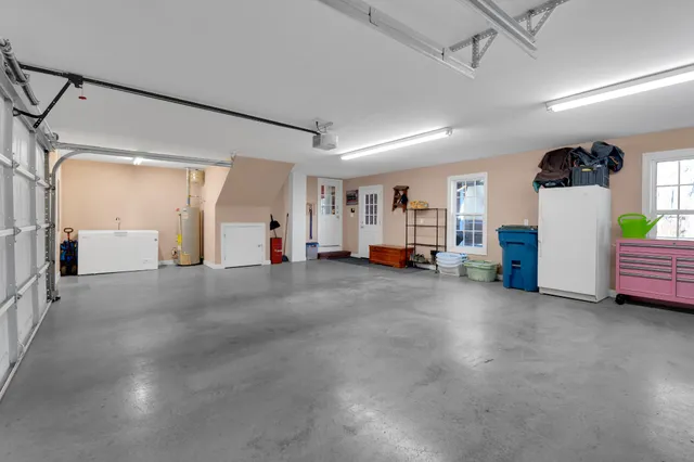 a aerial view of a house with a yard