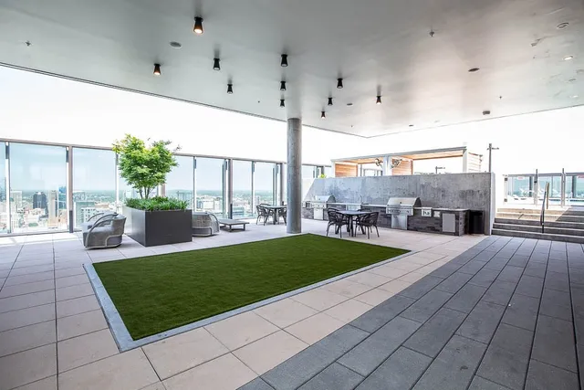 a view of a patio with swimming pool