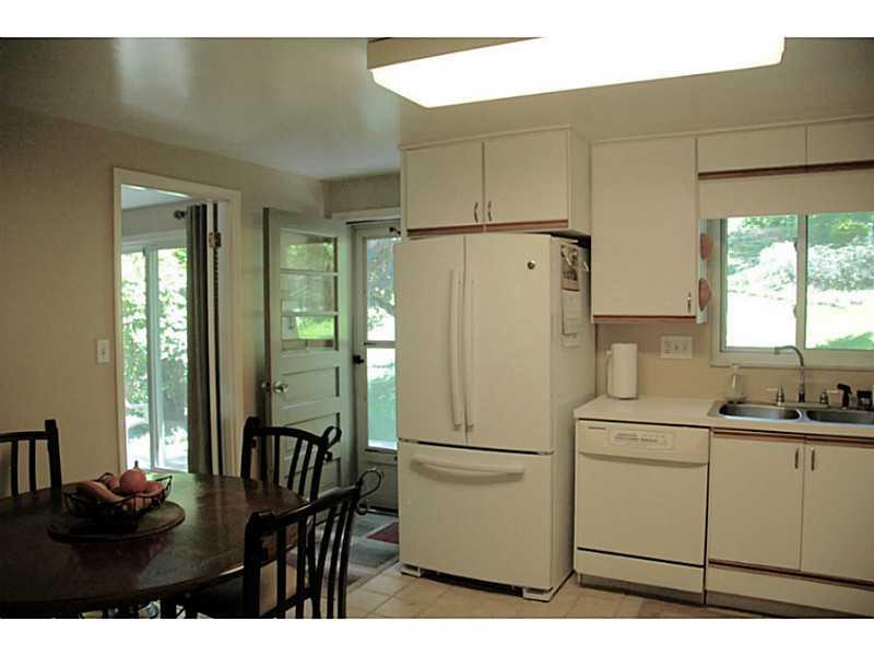 113 Kingsdale Road Churchill, PA 15221 - Photo 8 of 22 Kitchen. New Refrigerator, door to back yard