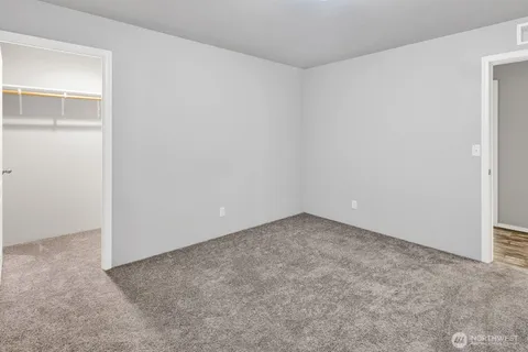 an empty room with a natural light