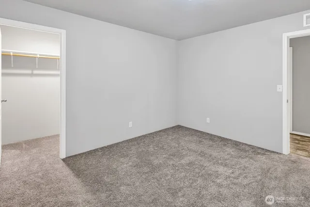 an empty room with a natural light