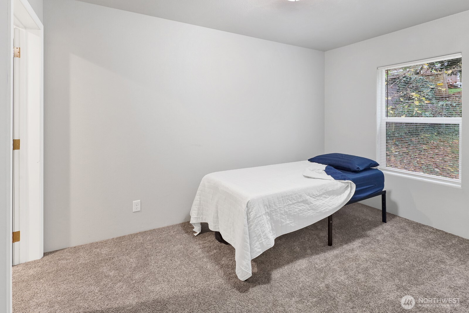 467 Cain Lake Road Sedro-Woolley, WA 98284 - Photo 23 of 28 a bedroom with a bed and a window