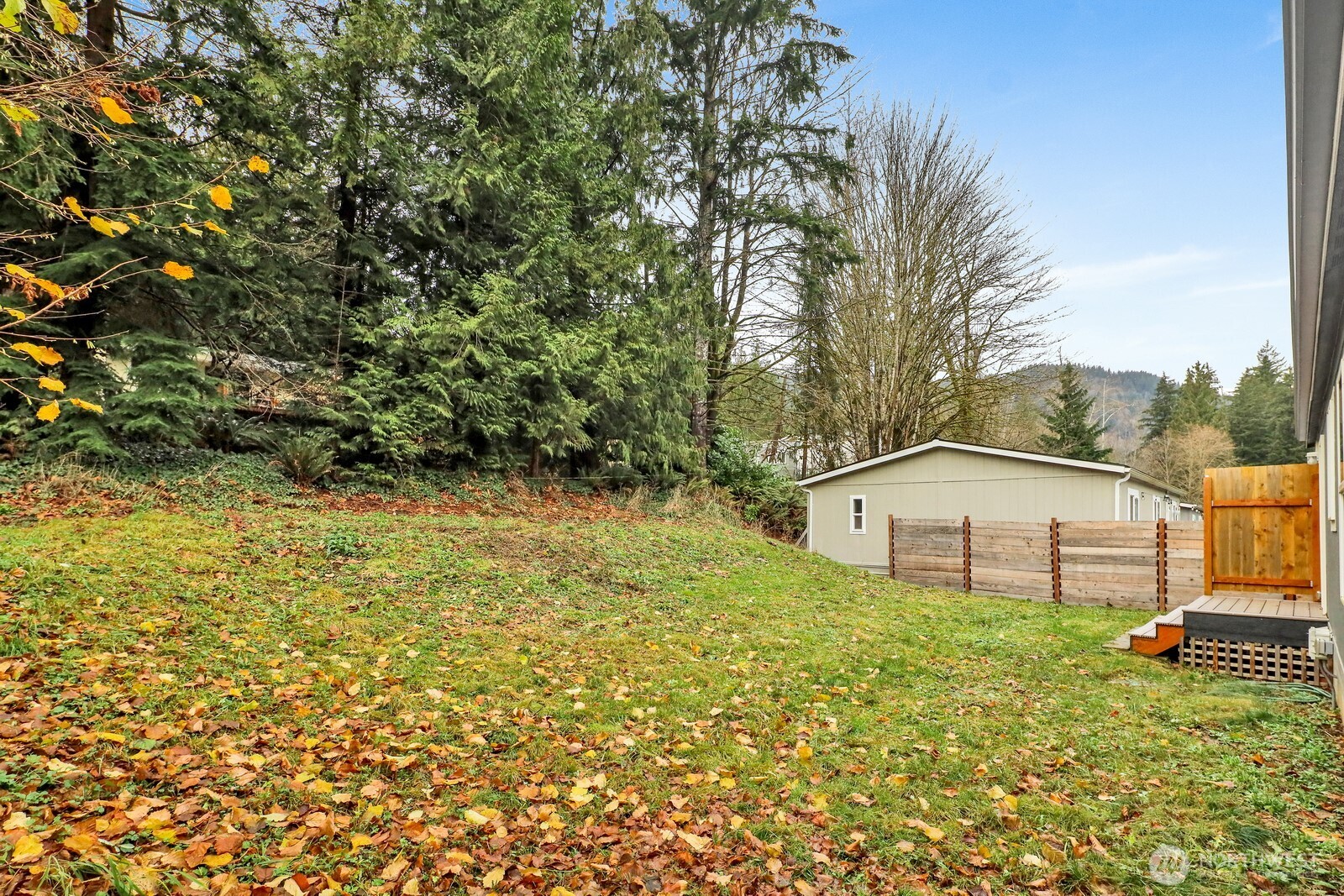 467 Cain Lake Road Sedro-Woolley, WA 98284 - Photo 28 of 28 a view of a house with a yard