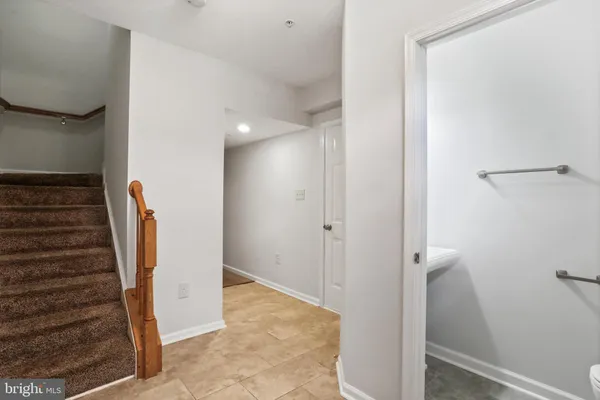 a view of hallway with stairs