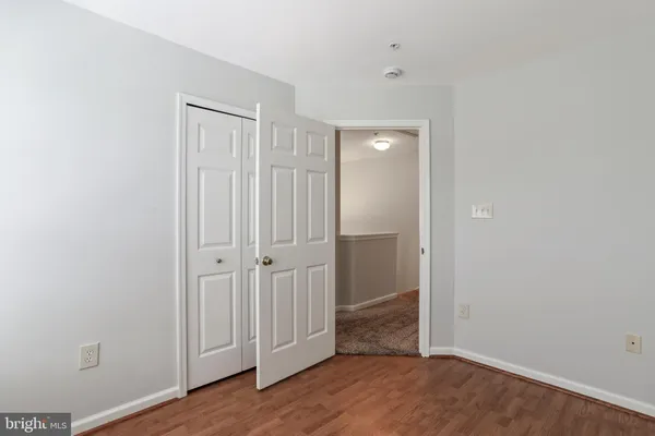 a view of a livingroom with wooden floor