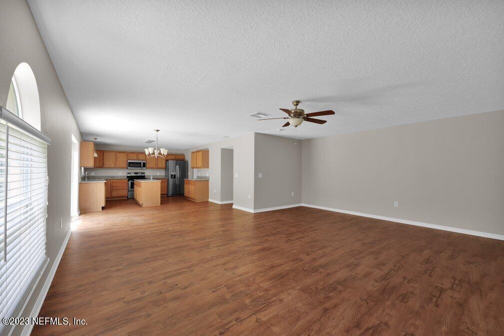 12070 Chester Creek Road Jacksonville, FL 32218 - Photo 20 of 45 a view of a livingroom with a kitchen